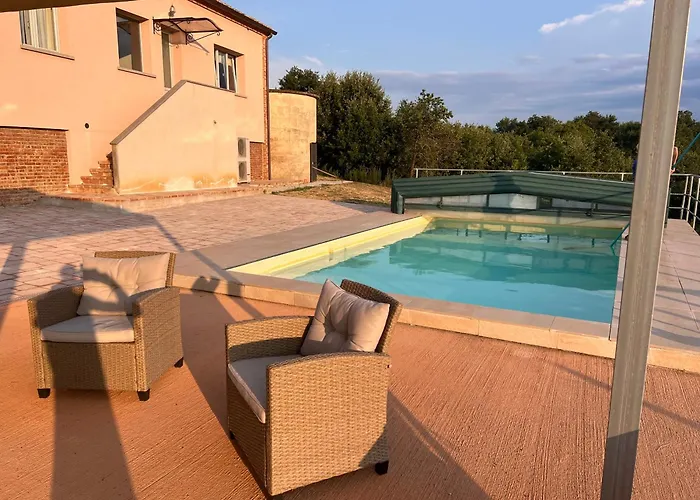 Podere Abbazia فندق مبيت وإفطار